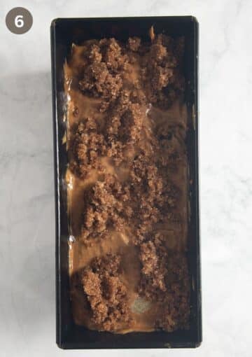 unbaked blackberry rhubarb loaf cake in the cake pan.