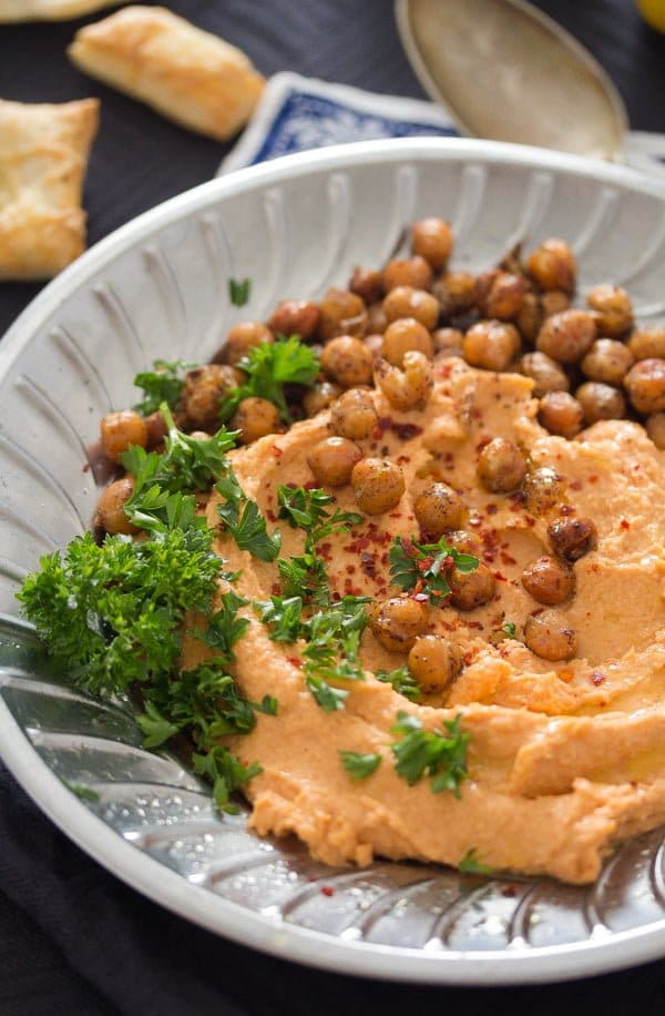 plate of hummus with roasted peppers 