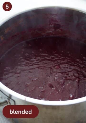 blended cherry butter in a pot.