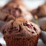pinterest image with the title cherry chocolate muffins.
