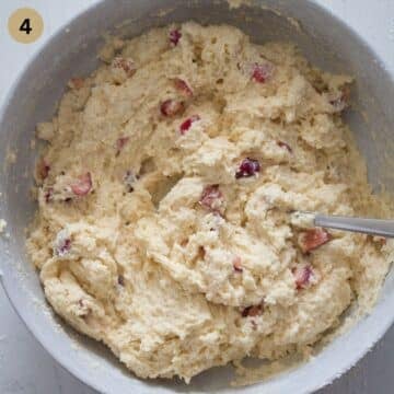 dough for making cherry scones in a bowl.