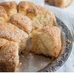 pull-apart yeast cake with one piece of it separated from the rest.