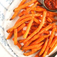 frozen fries cooked in an air fryer and served with dip.