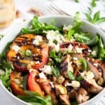 pinterest image with the title grilled peach and chicken salad.
