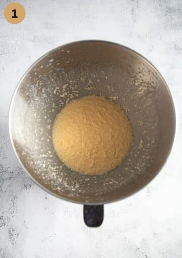 mixed butter and eggs in a bowl for making cake batter.