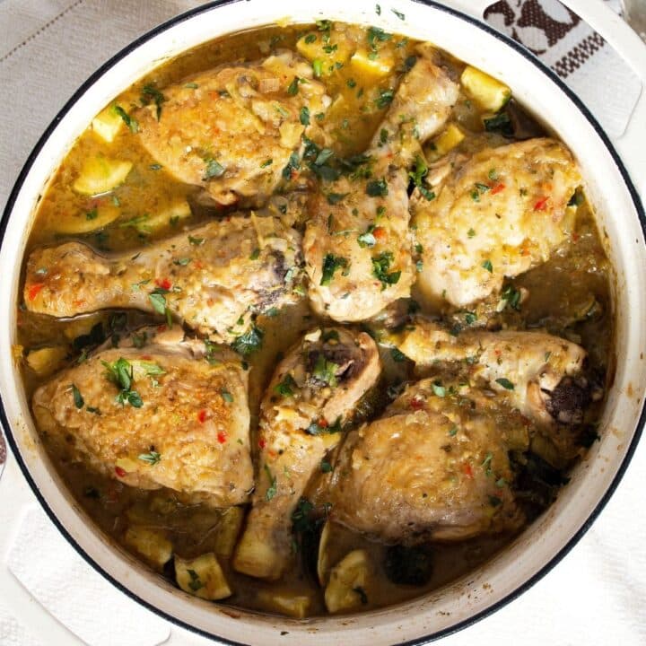 overhead view of mexican chicken legs simmered in green sauce.