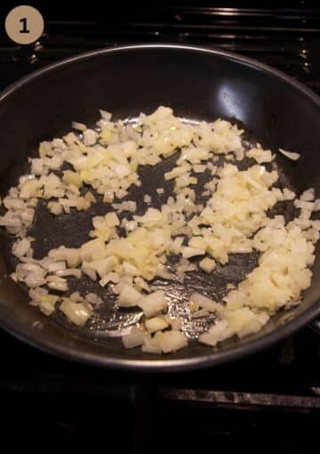 sauteing onions needed to make halloween meatloaf in a pan.