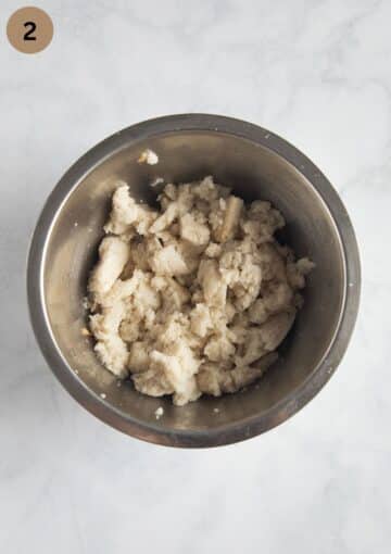 bread soaking in a bowl to make meatloaf.