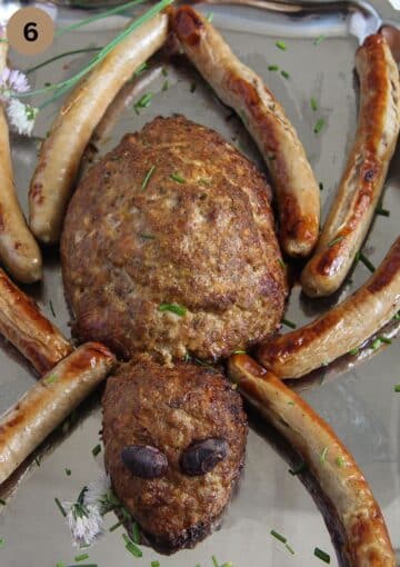 meatloaf in shape of a spider with long sausages used to make the legs.
