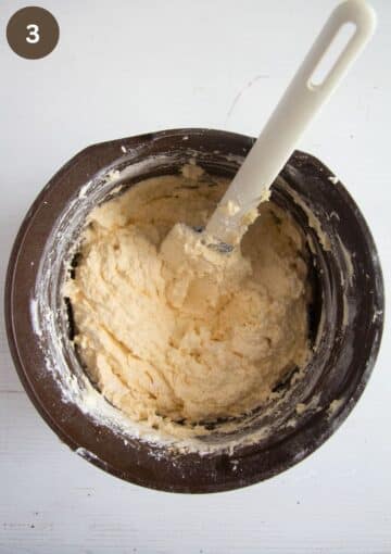 folding flour into cake batter with a rubber spatula.