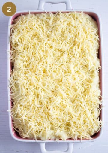 cabbage casserole coverd with grated cheese before baking. 