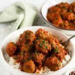 pinterest image with the title curried turkey meatballs.