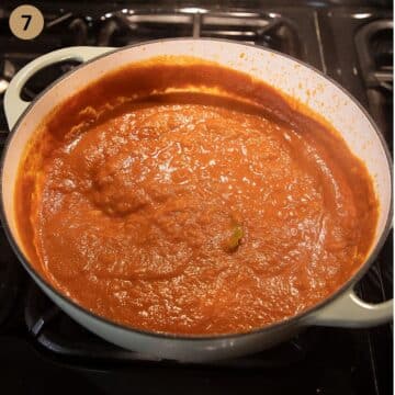 cooked curry sauce for turkey meatballs in a large pan.