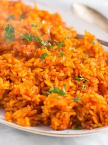 spicy nigerian jollof rice on a serving platter