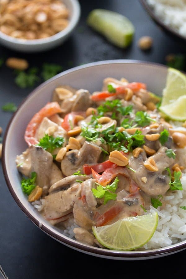 peanut butter chicken with rice in a bowl