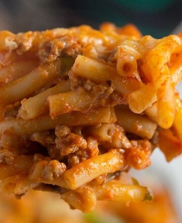bolognese pasta bake on a serving spoon