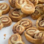 pinterest image with the title french cookies palmiers.