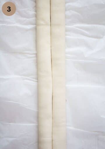 a puff pastry log rolled from both sides that meet in the middle.