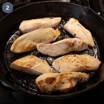 sear chicken breast pieces in a large skillet.