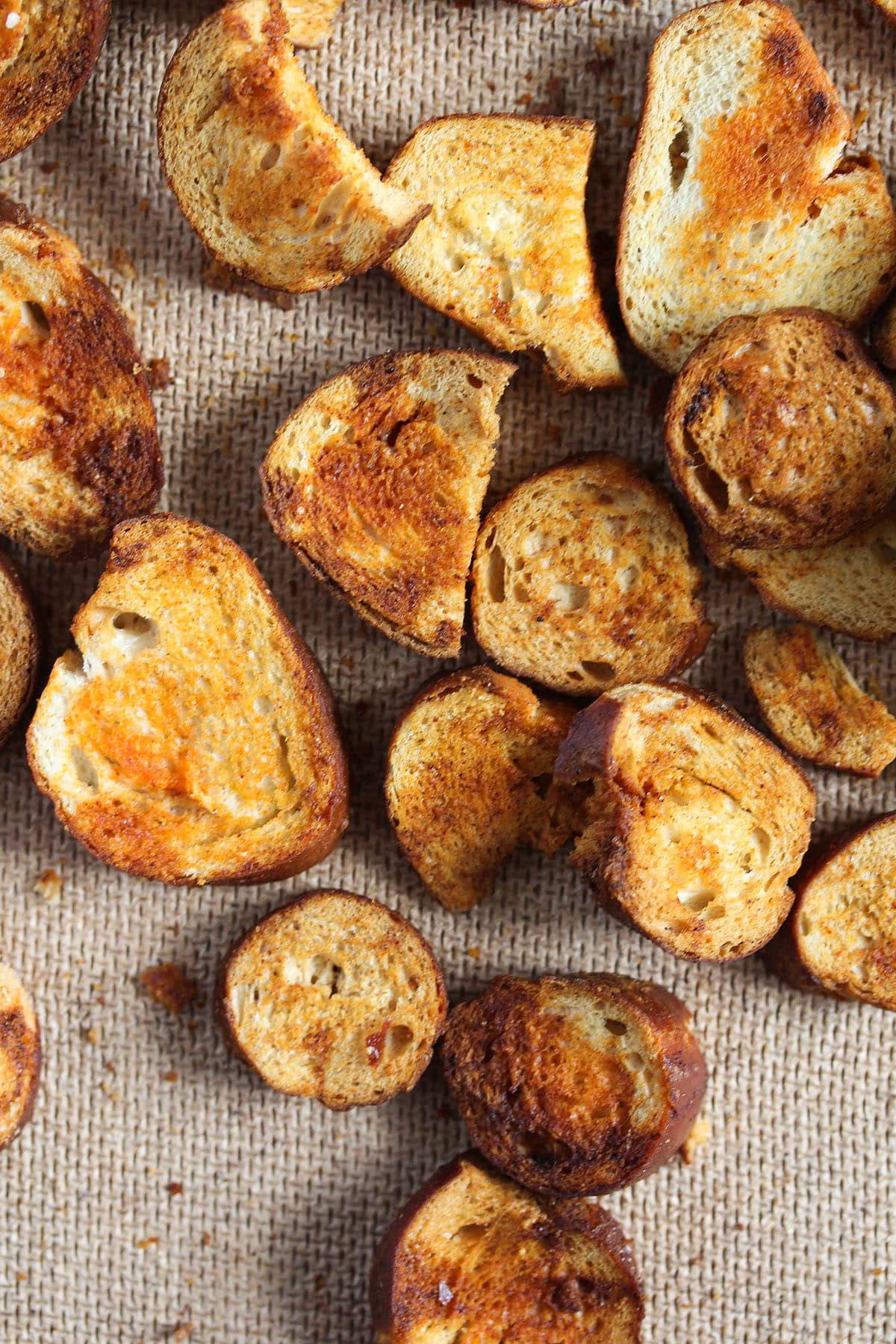 many pieces of pretzel chips spiced with paprika.