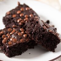 three moist low calorie brownies with chocolate chips.