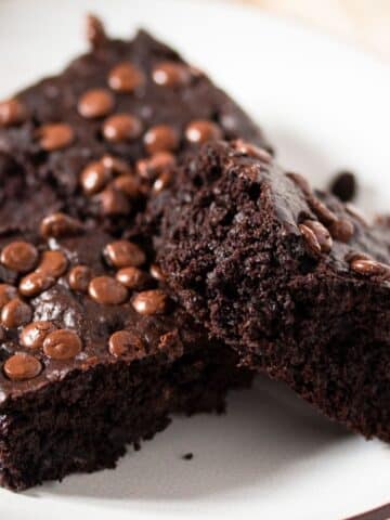 three moist low calorie brownies with chocolate chips.