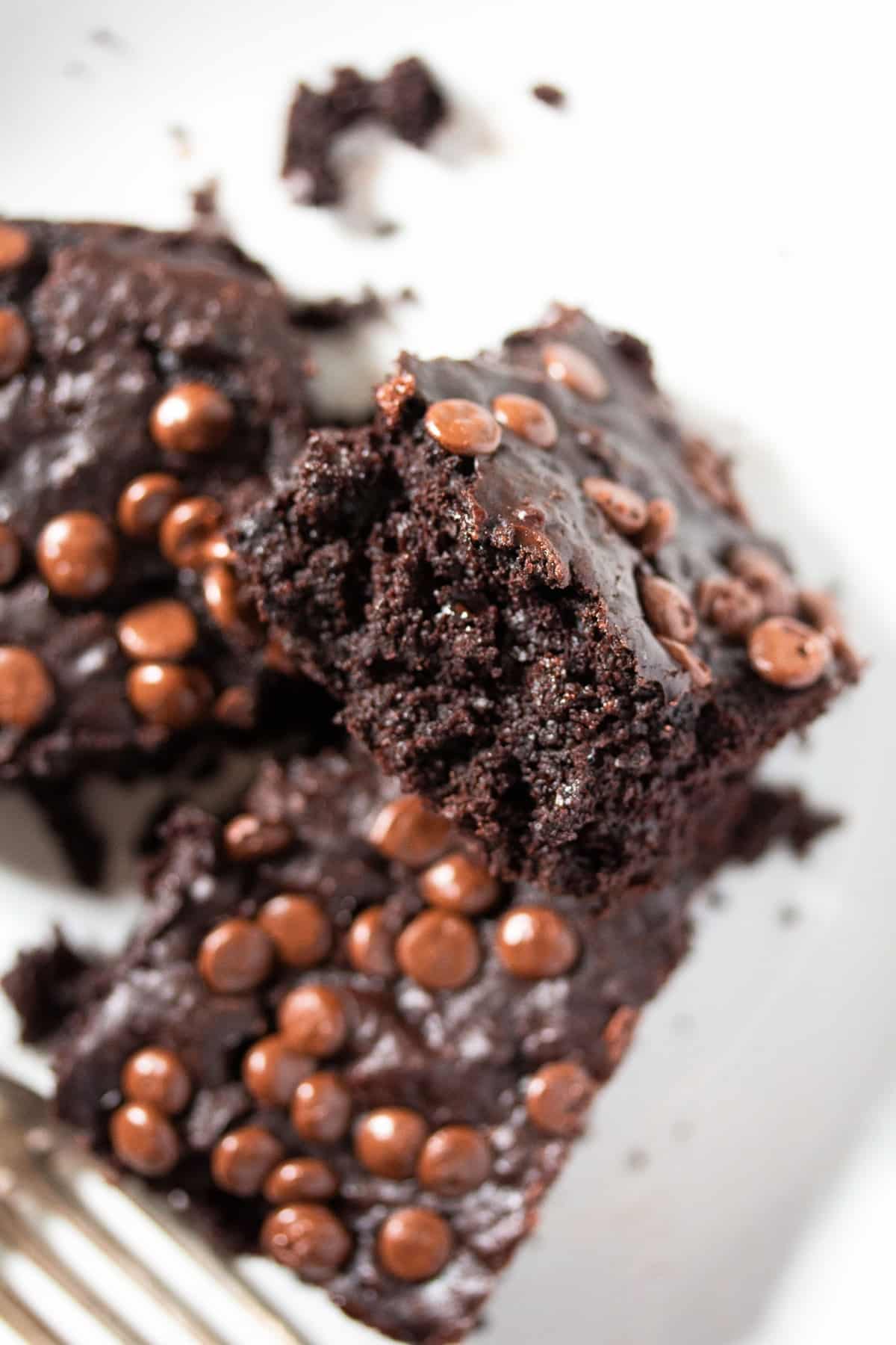 three brownies with chocolate chips stapled.