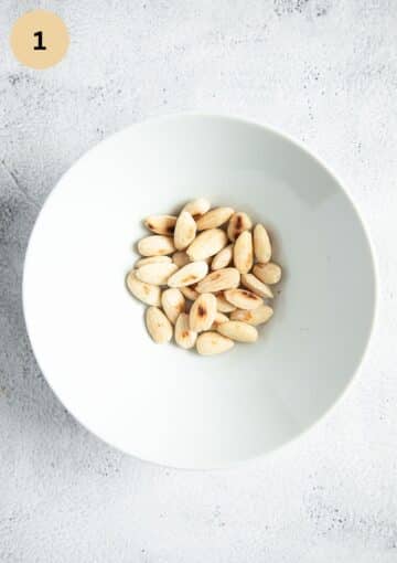 toasted almonds in a small bowl.