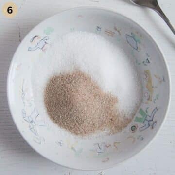 granulated sugar and vanilla sugar on a plate for making vanillekipferl.