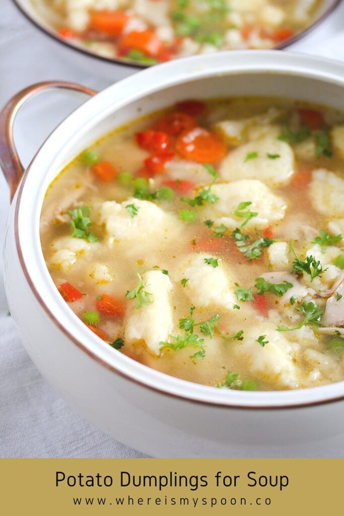 soup with potato dumplings, cauliflower and peas