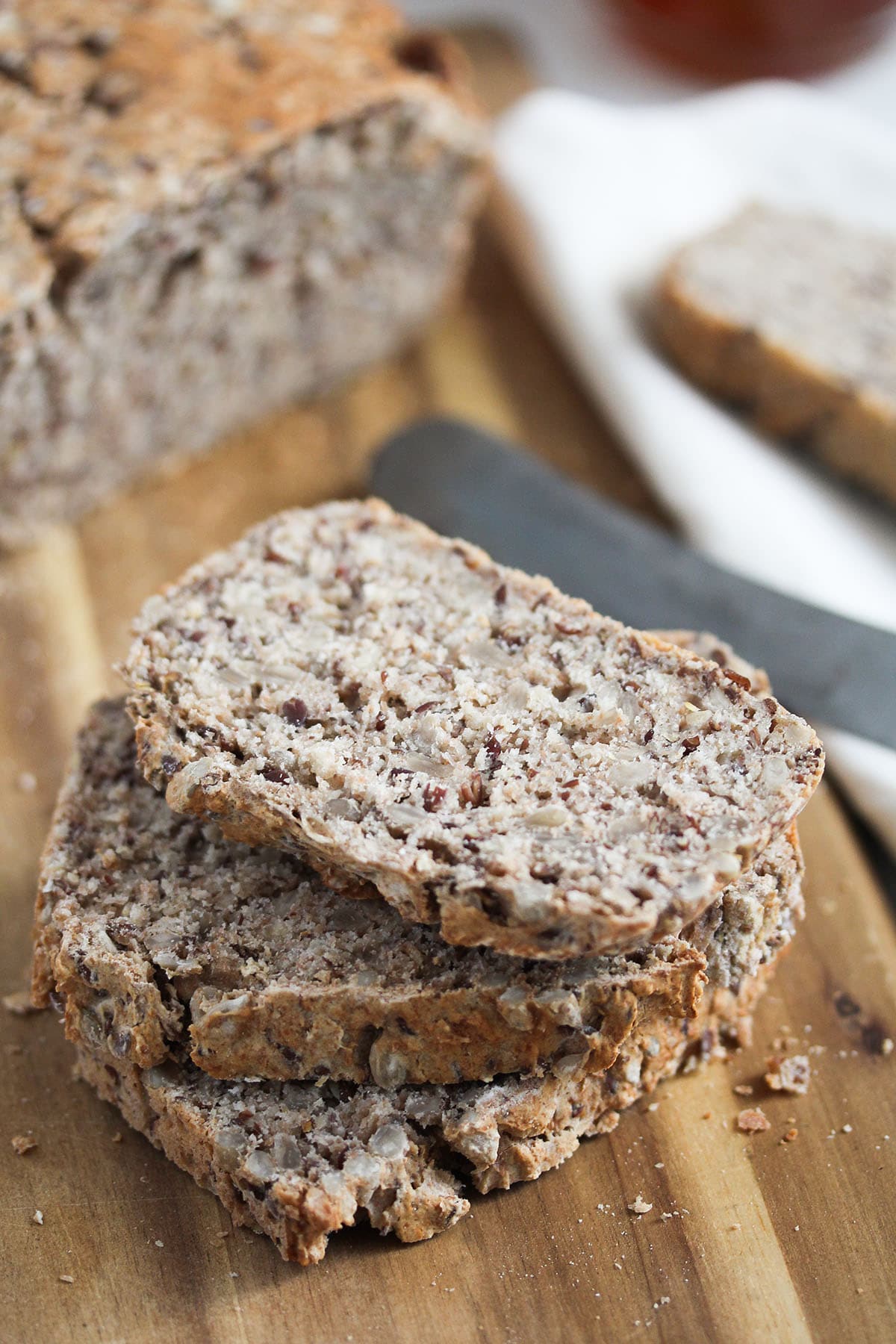 three stapled slices of no knead bread made with buckwheat.