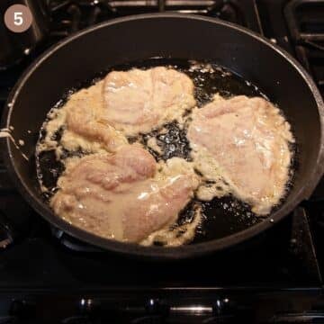 cooking pancake chicken in a pan.