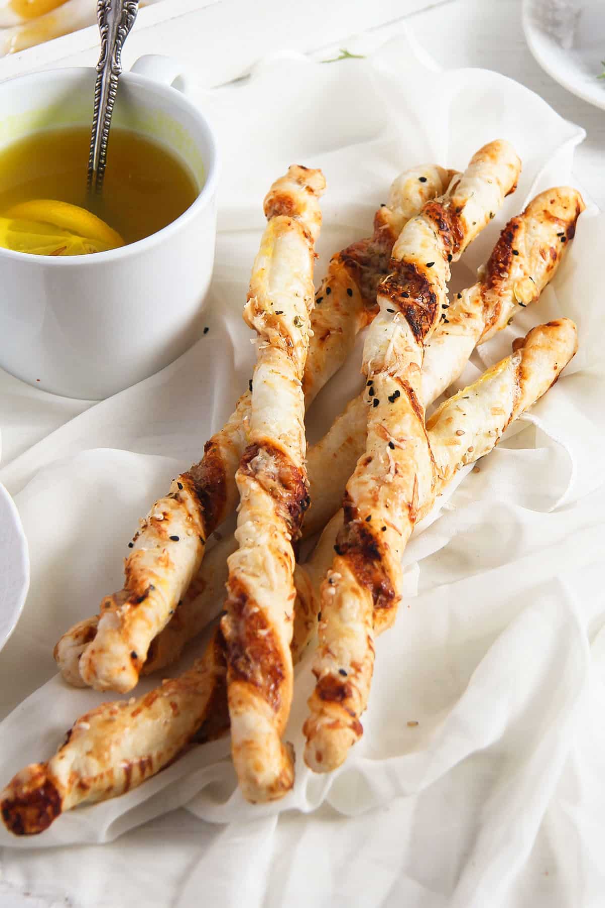 pizza twists with puff pastry and a cup of tea.