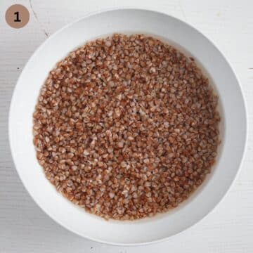 buckwheat groats soaking in a bowl of water.