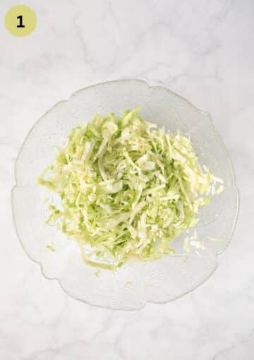 shredded cabbage for coleslaw in a bowl.