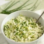 pinterest image with the title the best german coleslaw.