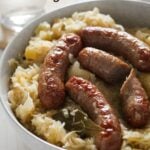 baked sausages and german sauerkraut in a bowl