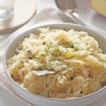 cabbage side dish in a large white bowl