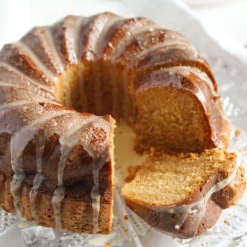 bailey's bundt cake sliced on a cake platter.