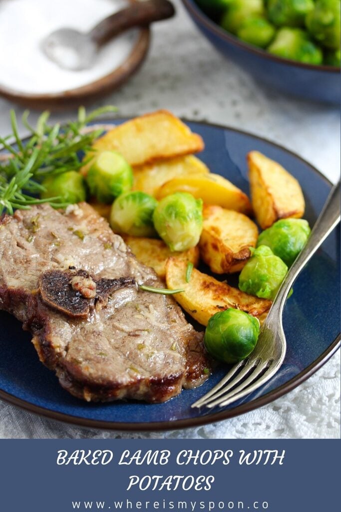 chops with potatoes and sprouts on a blue plate
