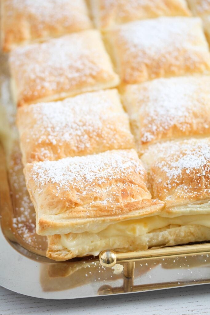 romanian cremeschnitte with crispy pastry on a platter