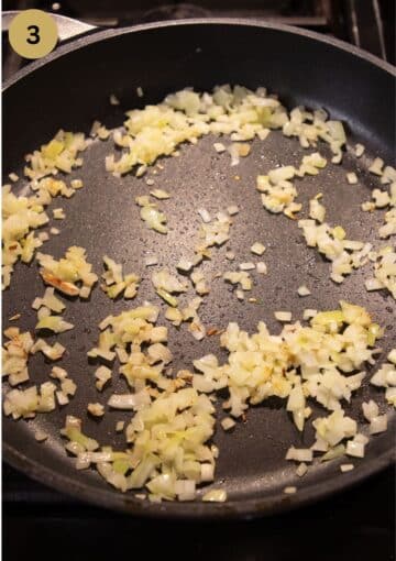 sauteing onions in a large pan.