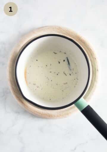 heated milk and scraped vanilla for making yeast dough in a small saucepan.