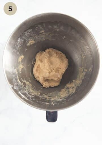 mixed ingredients for making yeast dough for pasca in a bowl.