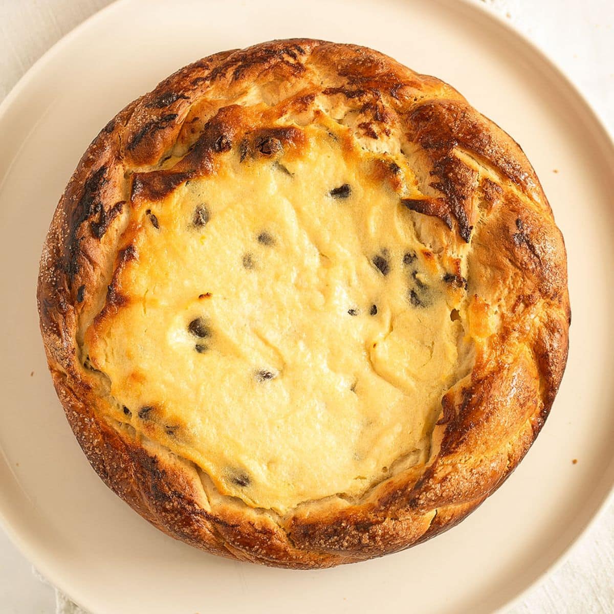 romanian pasca de pasti on a small white plate.
