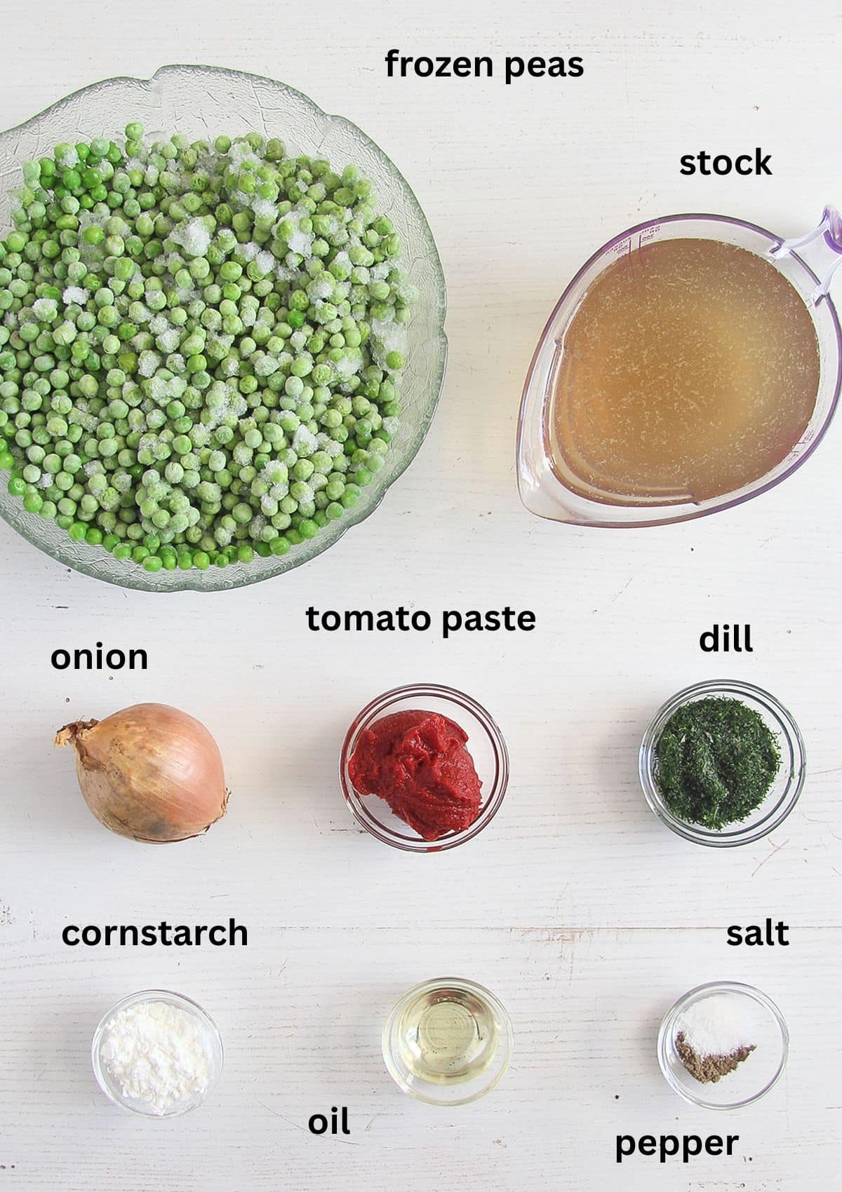 labeled ingredients for making pea and chicken stew on the table.