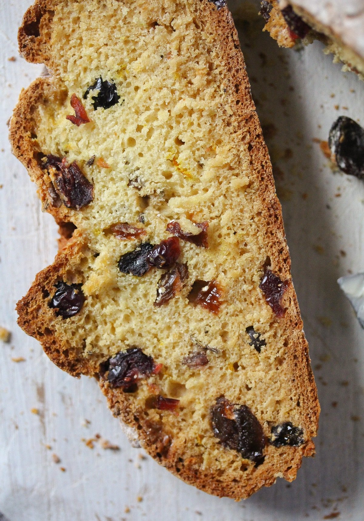 slice of brown bread with raisins close up