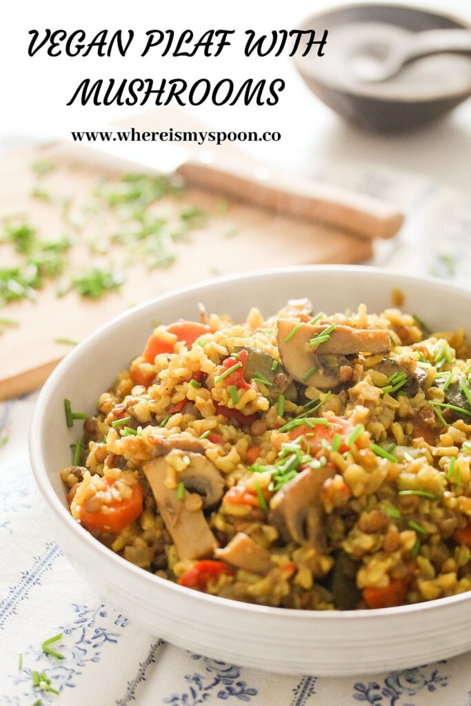 a large white bowl with vegetable pilaf