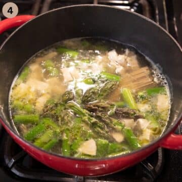 adding asparagus tips to chicken soup.