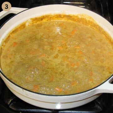 simmering coconut curry on the stovetop.